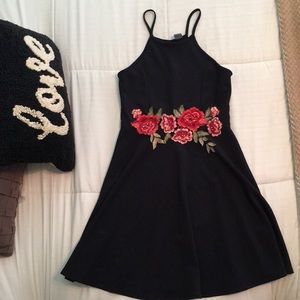 Black dress with floral application